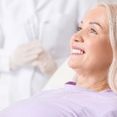 patient getting dentures in Fayetteville