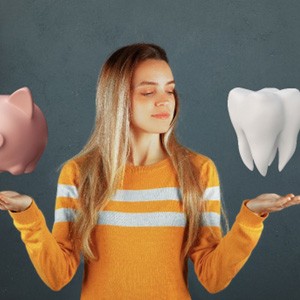 A piggy bank and a giant tooth hovering over a woman’s hands